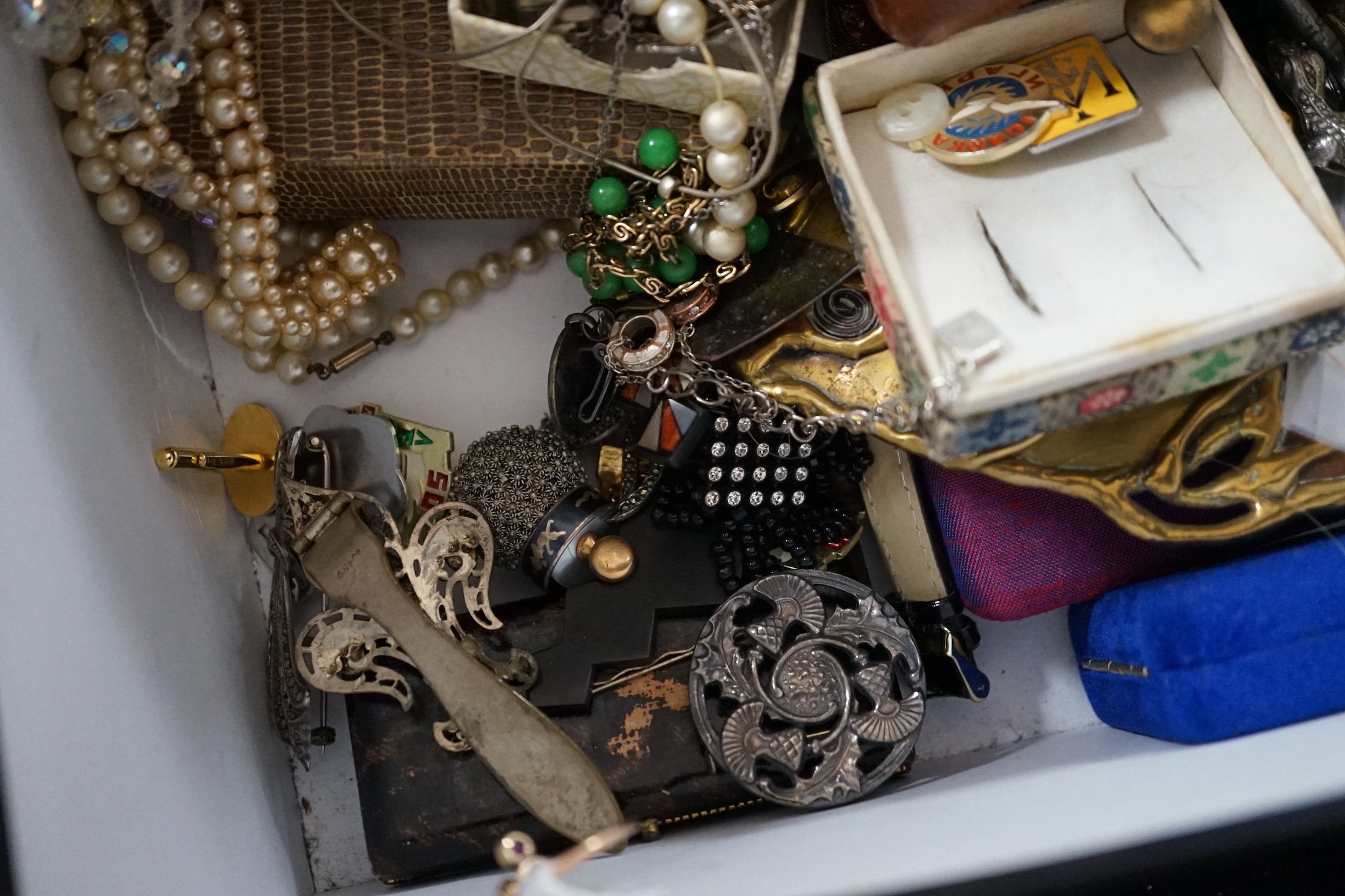 A yellow metal and gem set ring and a large quantity of assorted costume jewellery.